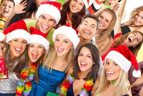 smiling group of young people with Christmas spirit