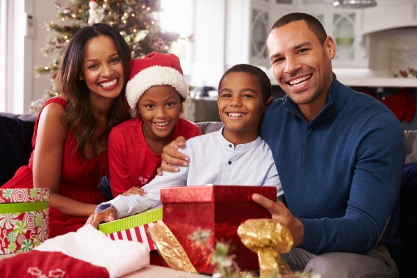 family opening christmas presents
